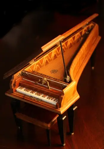 Miniature harpsichord with its lid raised